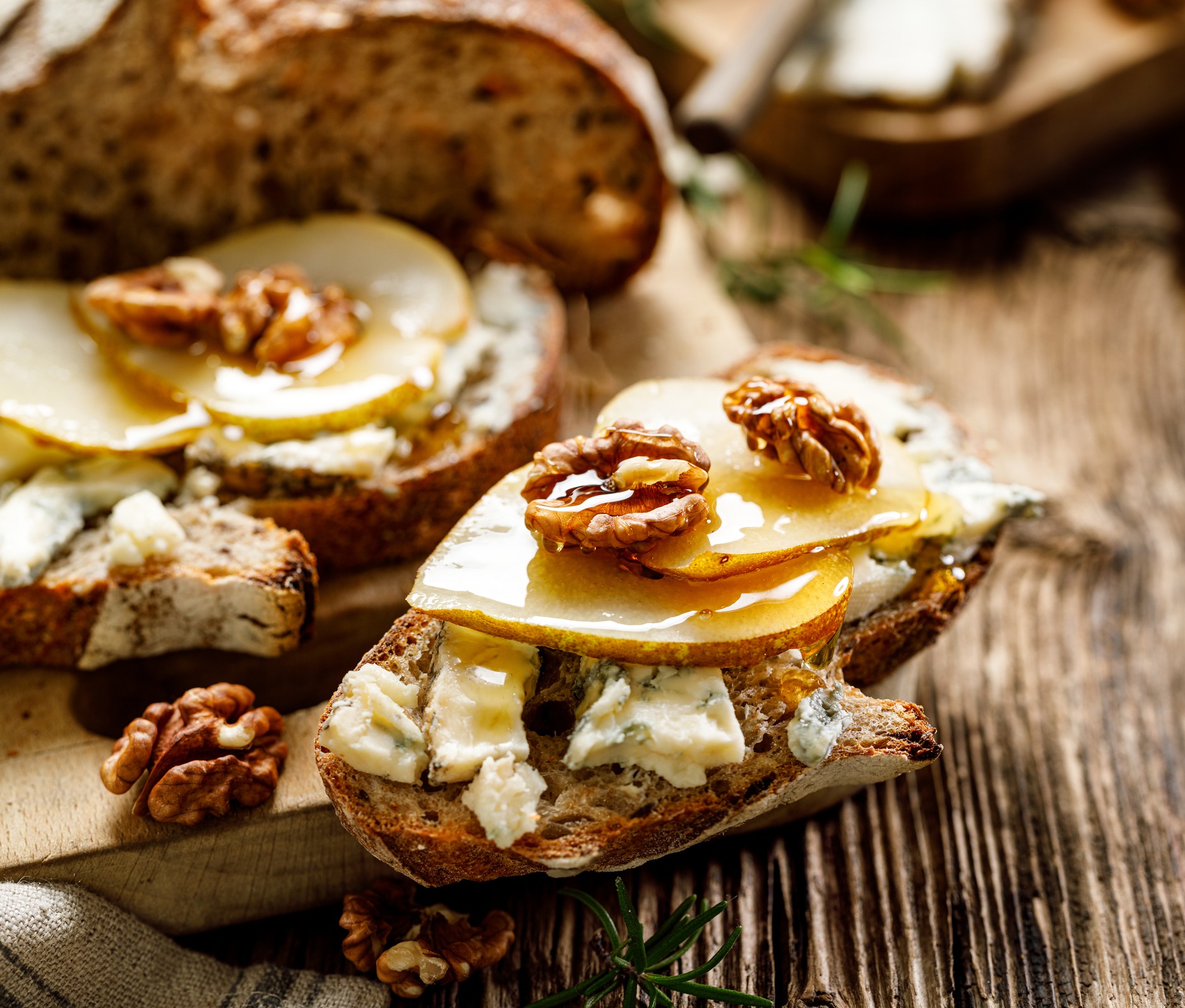 sourdough bread sandwich with gorgonzola cheese walnuts and honey 201583821