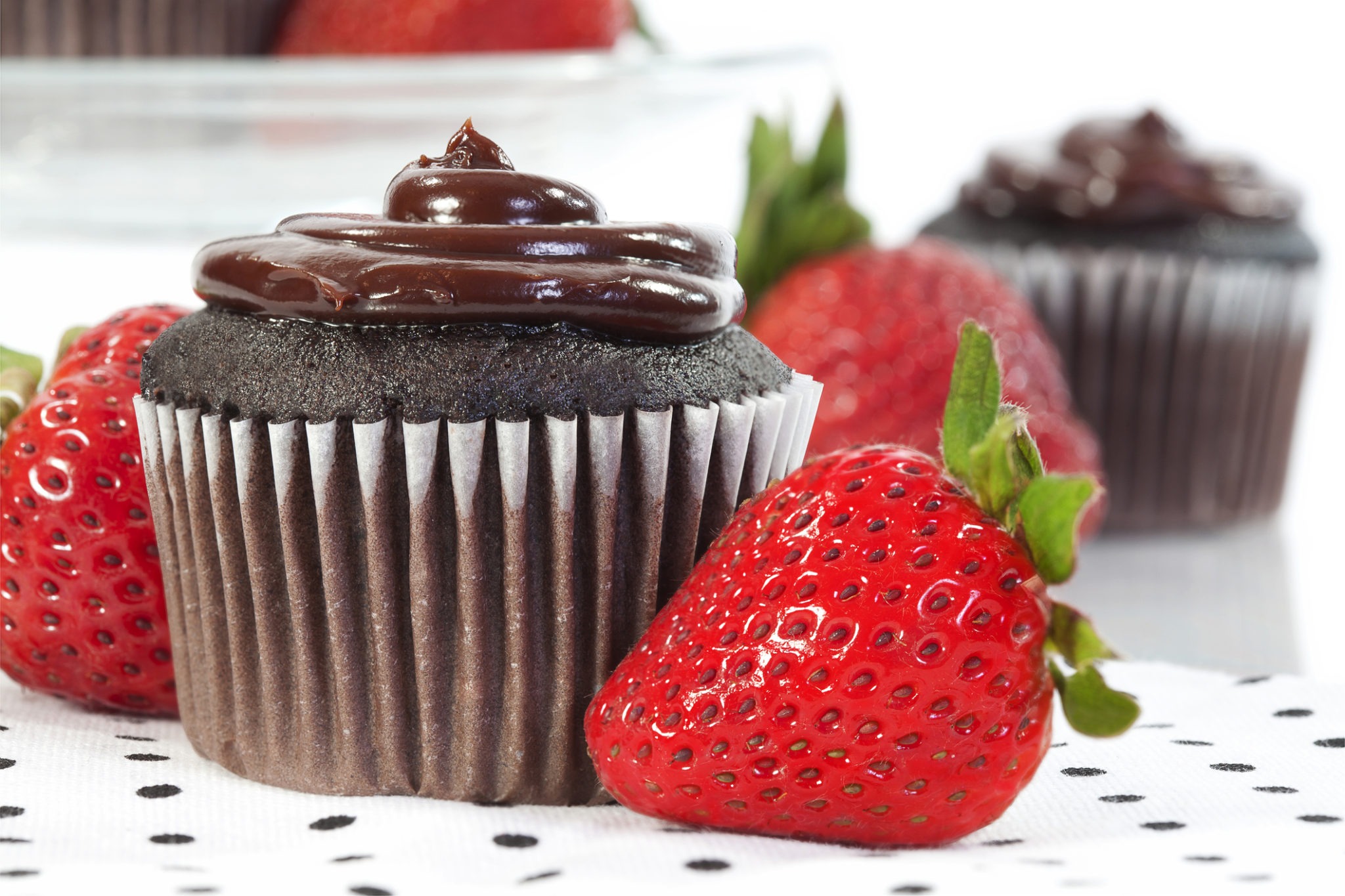chocolate frosted cupcake and strawberry 45349931 scaled