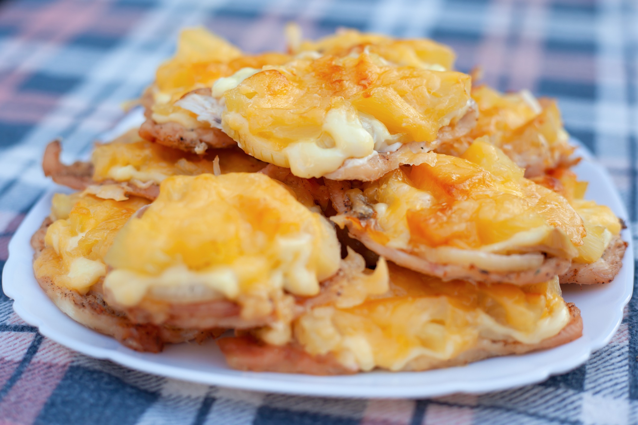 french chops dish of chicken meat pineapple and cheese 179904334